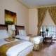غرفة بسريرين2  فندق جراند سفير - المنامة | هوتيلز بوكينج