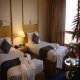 غرفة بسريرين  فندق دايز - المنامة | هوتيلز بوكينج