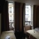 غرفة بالشقة فندق كلينان كورت - باريس | هوتيلز بوكينج