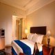 غرفة  فندق جراند كيمانج - جاكرتا | هوتيلز بوكينج