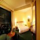 غرفة  فندق ترافلرز - جاكرتا | هوتيلز بوكينج