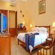 غرفة  فندق جراند إستانا راما - كوتا بالي | هوتيلز بوكينج