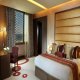غرفة نوم جناح فندق سفير - الكويت | هوتيلز بوكينج