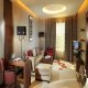 غرفة معيشة جناح فندق سفير - الكويت | هوتيلز بوكينج