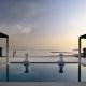 حمام السباحة المطل على الشاطئ  فندق البستان بالاس انتركونتيننتال - مسقط | هوتيلز بوكينج