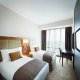 غرفة  فندق انتركونتيننتال ذا سيتي - الدوحة | هوتيلز بوكينج