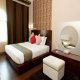 غرفة  فندق رتاج إن - الدوحة | هوتيلز بوكينج