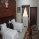 غرفة نوم بالشقة فندق ضيافات الحرمين (دار المتقين) - مكة المكرمة | هوتيلز بوكينج