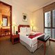 غرفة فاخرة  فندق أوركارد بارك  سويتس - سنغافورة | هوتيلز بوكينج