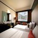 غرفة بسريرين  فندق إمباسادور - بانكوك | هوتيلز بوكينج