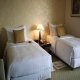 غرفة بسريرين2  فندق إمبوريوم سويت - بانكوك | هوتيلز بوكينج