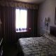 غرفة فاخرة فندق فور كوينز - لاس فيجاس | هوتيلز بوكينج
